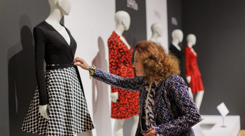 Diane von Furstenberg reviews the display of her wrap dresses through the decades.